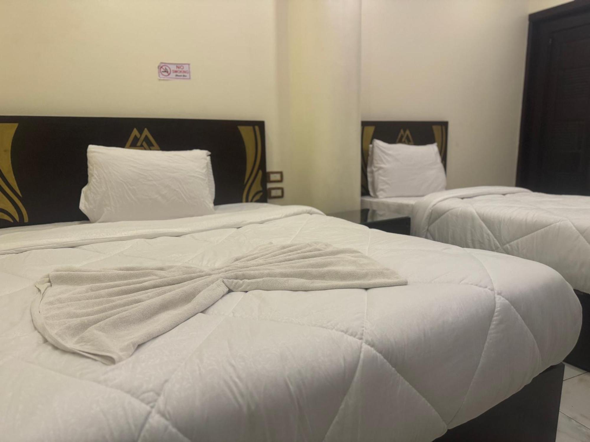 Kafret el-Gabal Pyramids And Sphinx Hotel מראה חיצוני תמונה